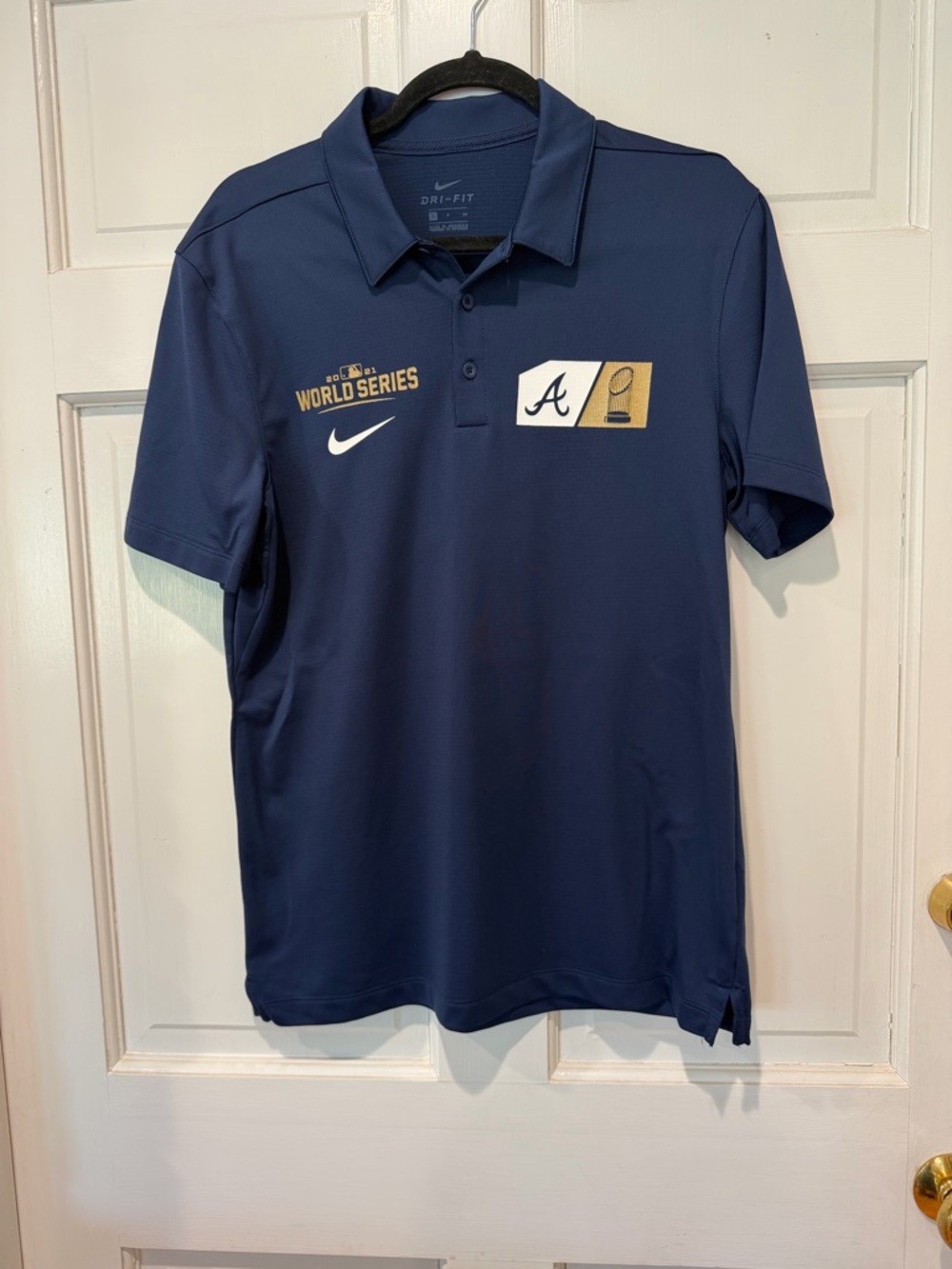 NWOT Men’s Nike Navy Dri-FIT Polo with World Series and Atlanta Braves Logos